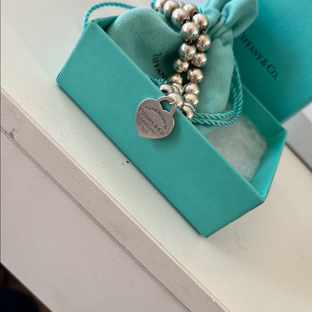 Beautiful return Tiffany beaded bracelet comes with box this is a reposh